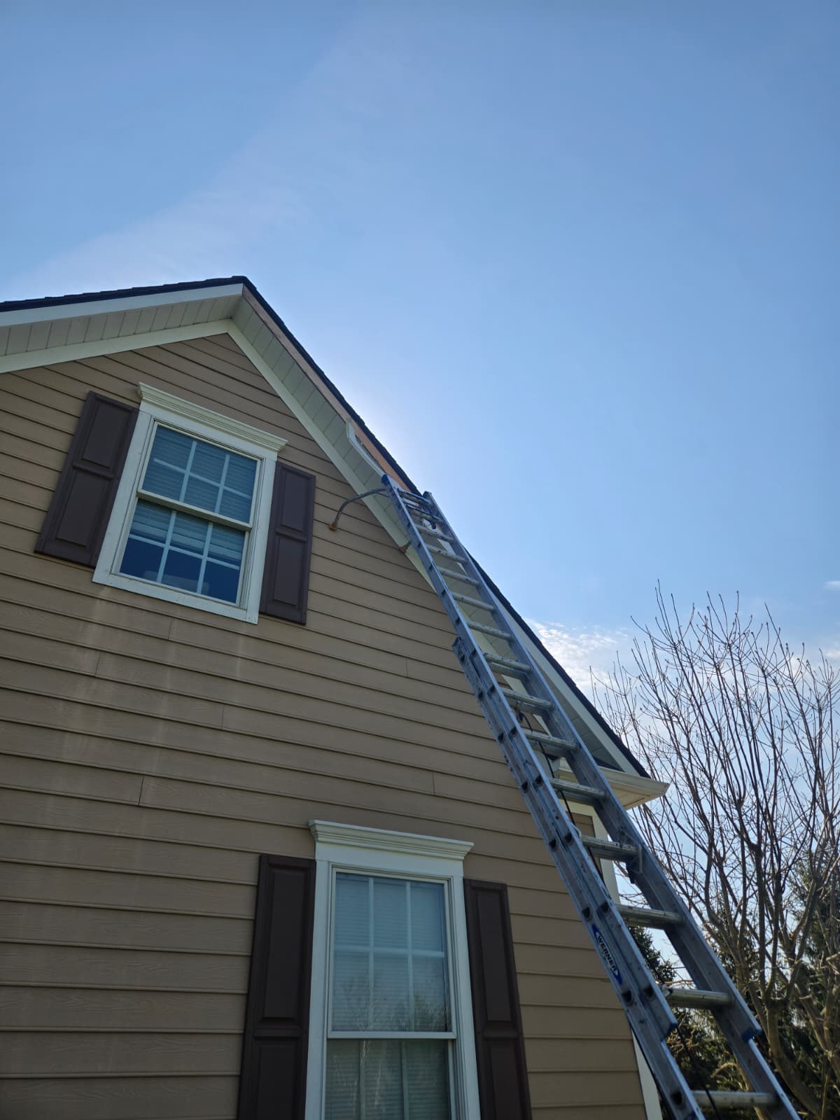 New fascia board installed along roof edge