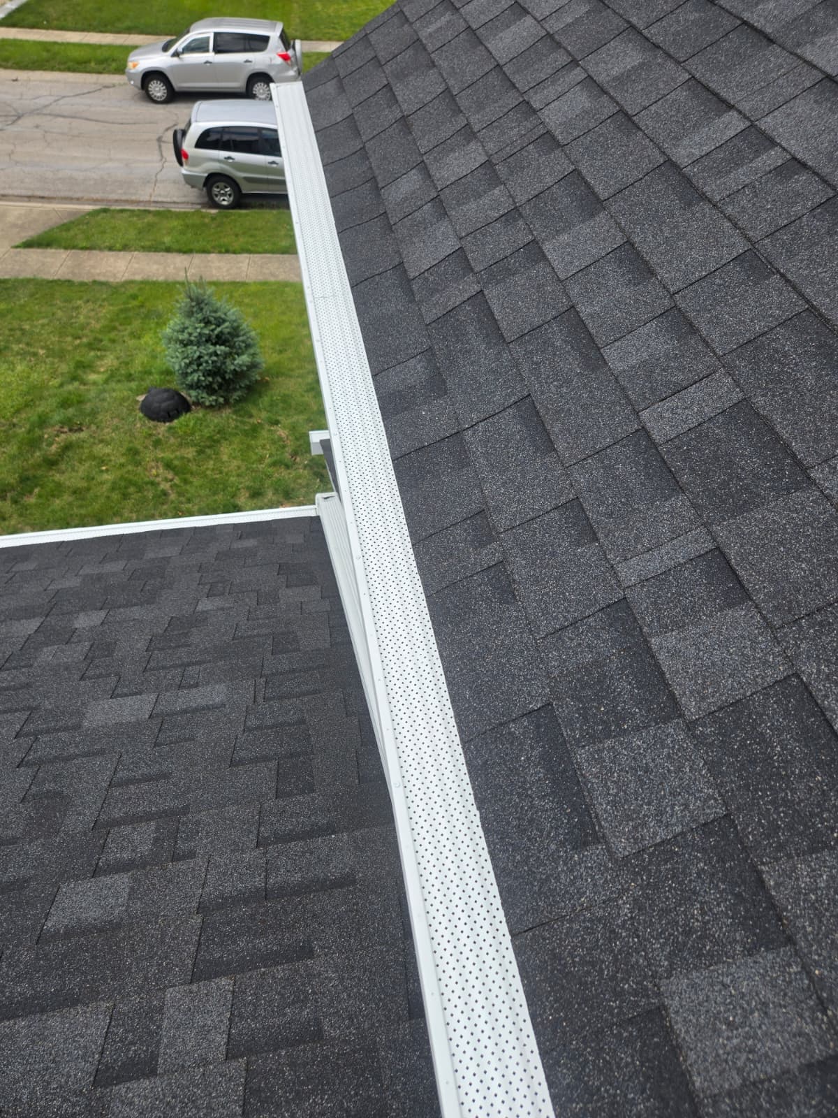 Completed gutter and downspout installation