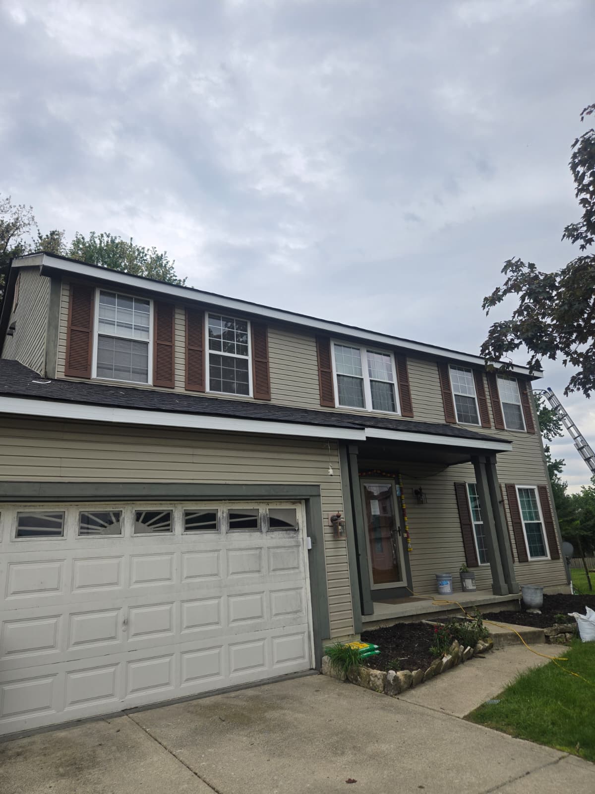 Home exterior with new gutters